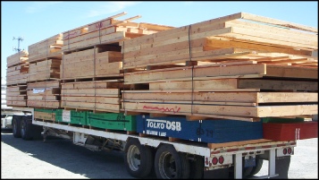 PMHI Factory Framed Wall Panels loaded on a truck.